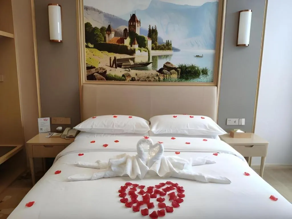 Bed in Vienna Hotel Fujian Fuqing Wanda Plaza