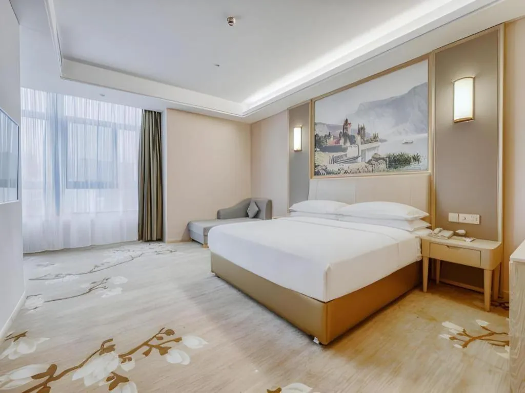 Bed in Vienna Hotel Fujian Fuqing Wanda Plaza