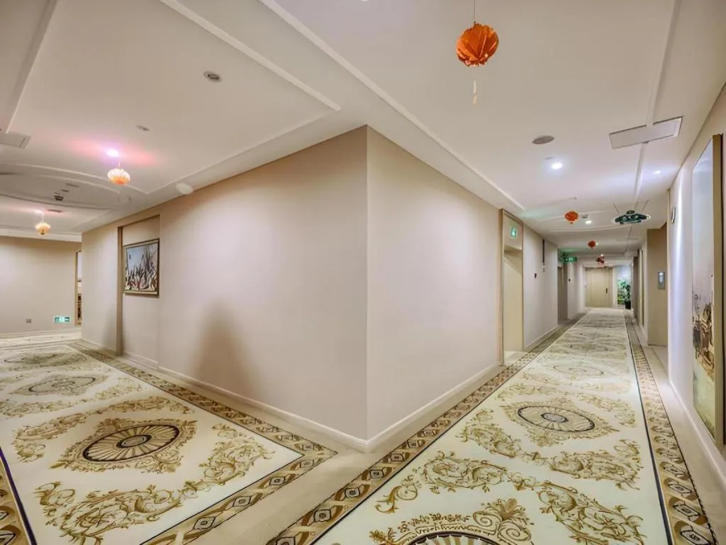 Bed in Vienna Hotel Fujian Fuqing Wanda Plaza