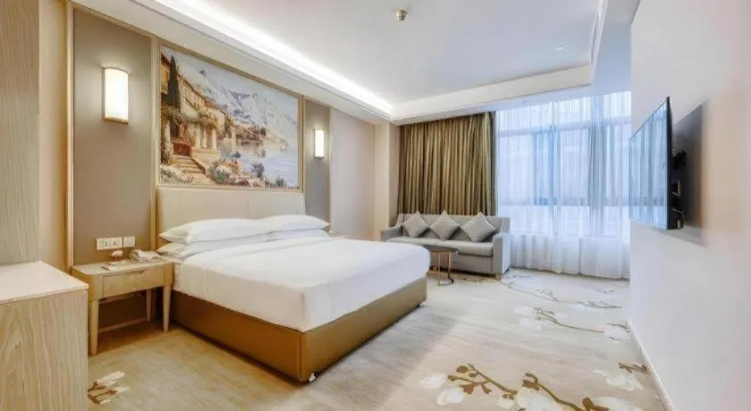 Bed in Vienna Hotel Fujian Fuqing Wanda Plaza