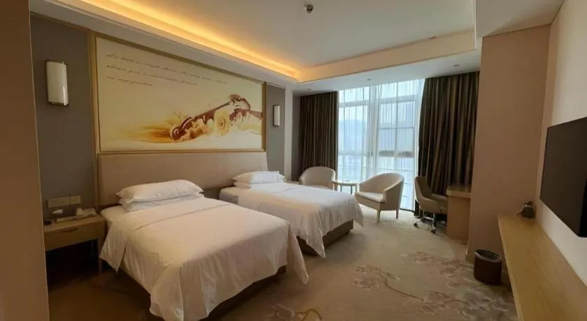 Bed in Vienna Hotel Fujian Fuqing Wanda Plaza