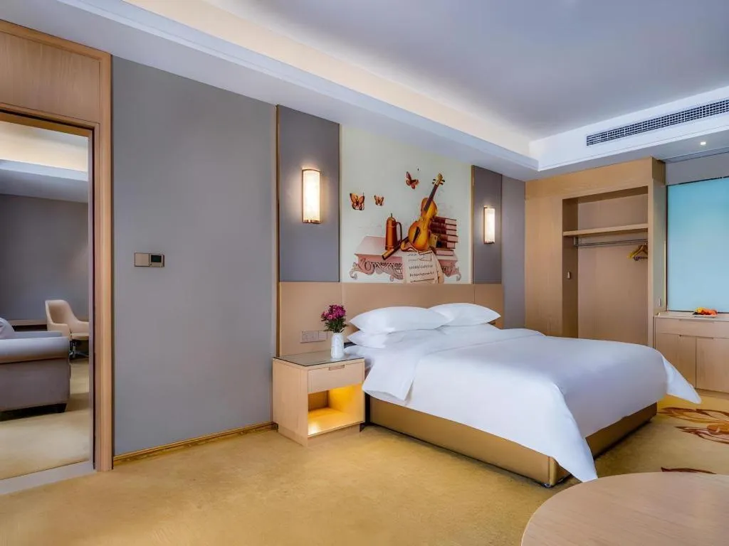 Bed in Vienna Hotel Anhui Fuyang Funan Bailing Apartment