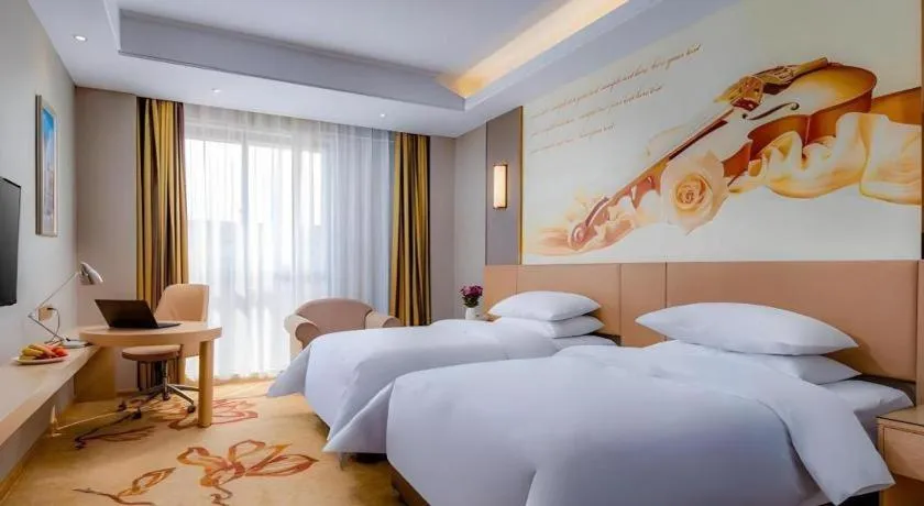 Bed in Vienna Hotel Anhui Fuyang Funan Bailing Apartment