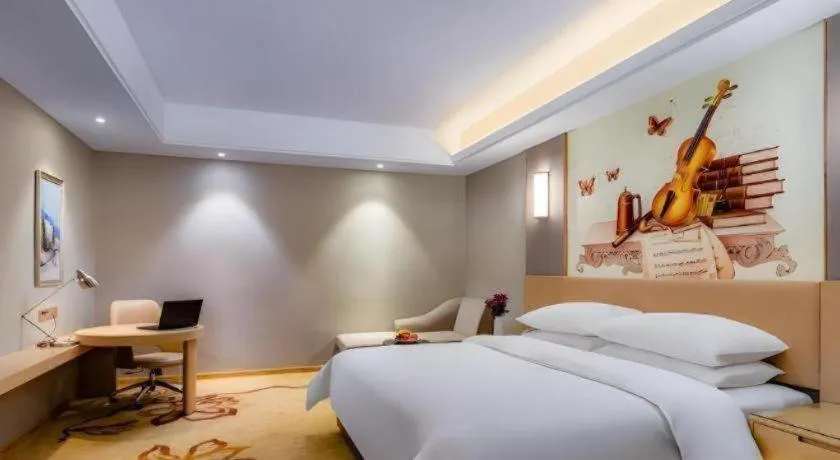 Bed in Vienna Hotel Anhui Fuyang Funan Bailing Apartment