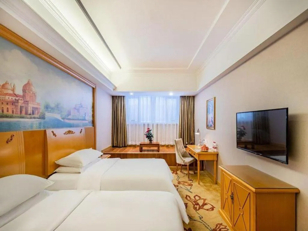 Bed in Vienna Hotel Tianjin Zhongbei Town