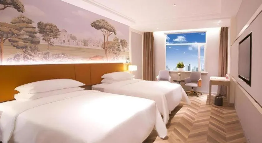 Bed in Vienna Hotel Jinan Beiyuan Street Red Star Macalline