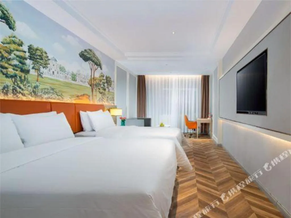 Bed in Vienna Hotel Jinan Beiyuan Street Red Star Macalline