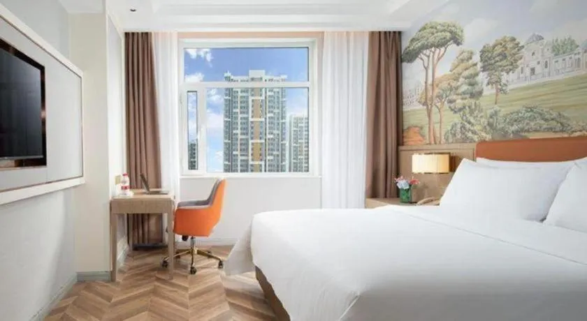 Bed in Vienna Hotel Jinan Beiyuan Street Red Star Macalline