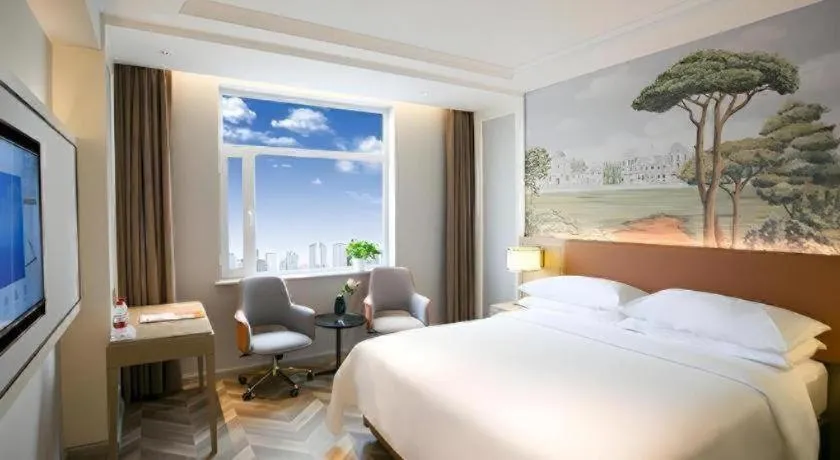 Bed in Vienna Hotel Jinan Beiyuan Street Red Star Macalline