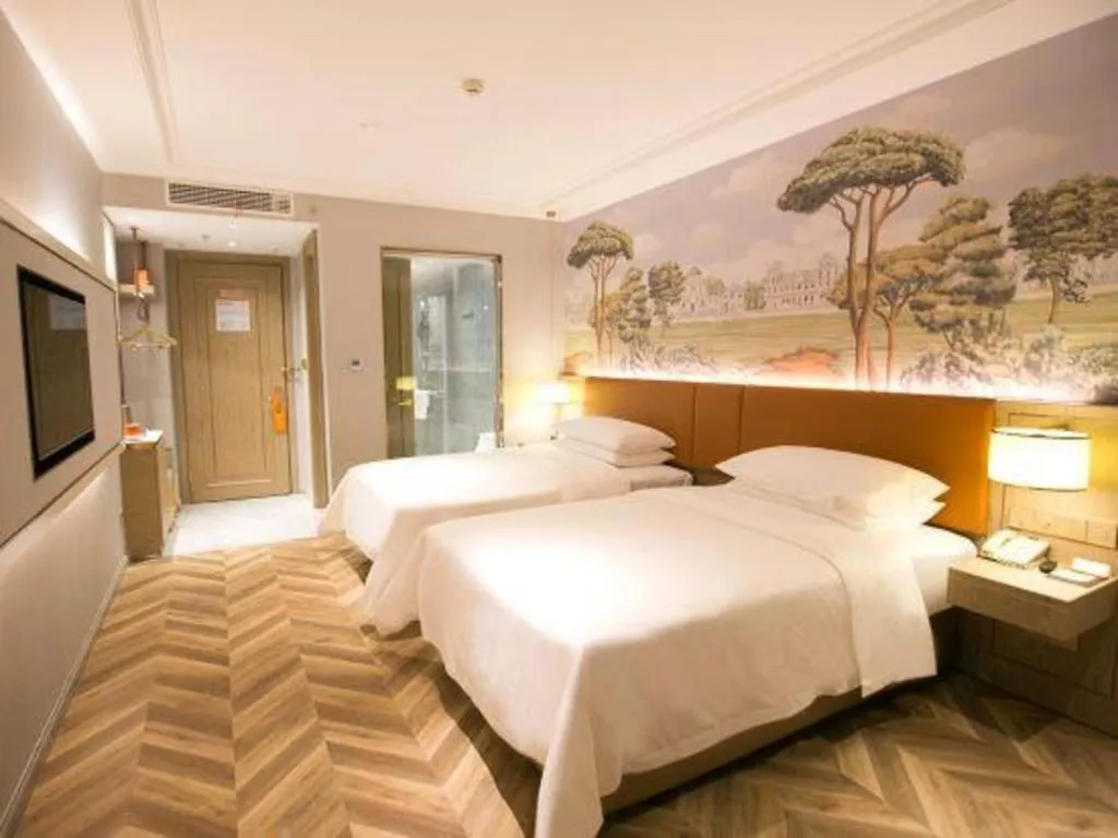 Bed in Vienna Hotel Jinan Beiyuan Street Red Star Macalline
