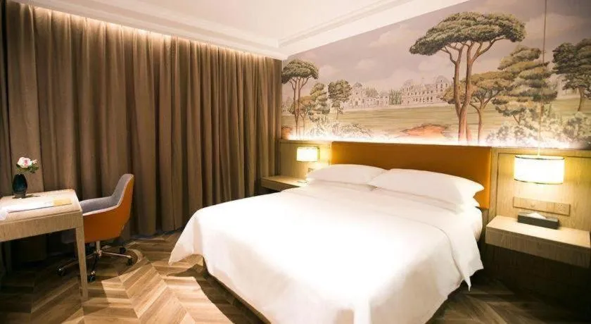 Bed in Vienna Hotel Jinan Beiyuan Street Red Star Macalline