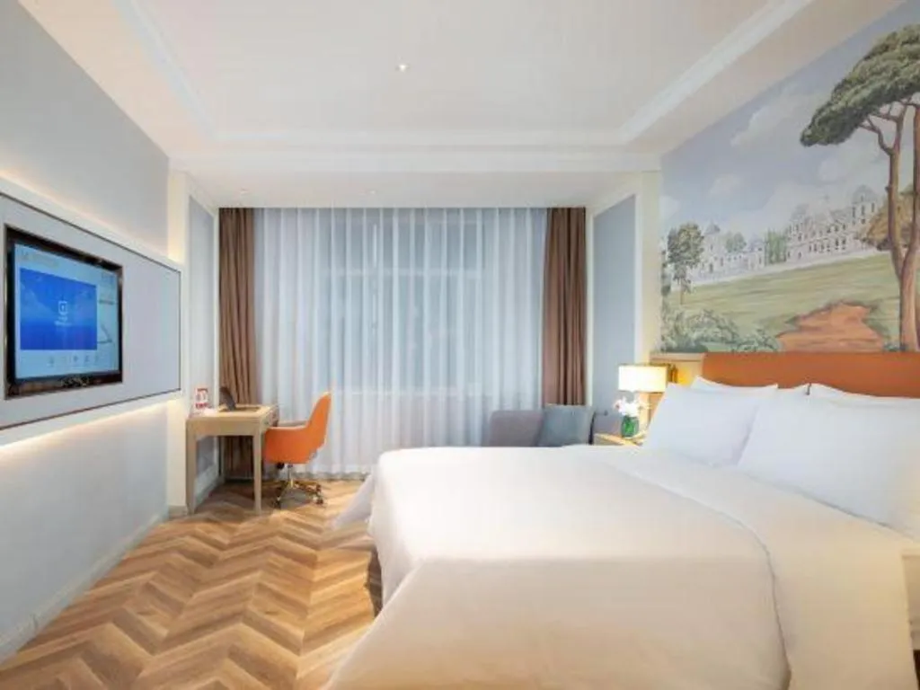 Bed in Vienna Hotel Jinan Beiyuan Street Red Star Macalline