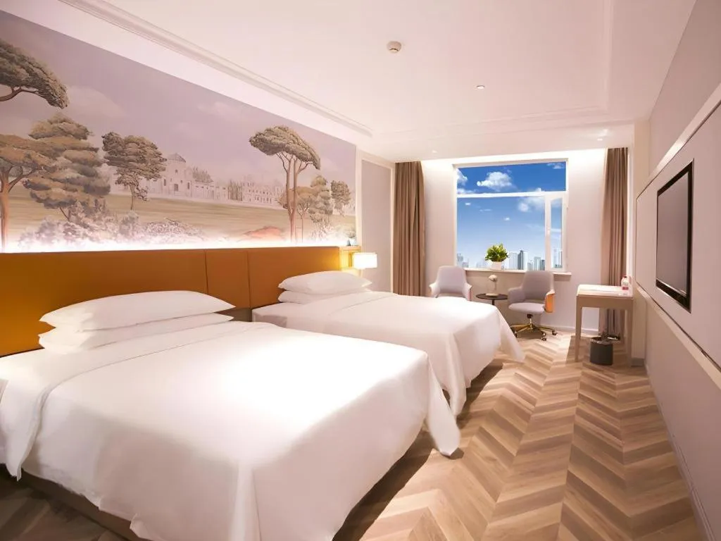 Bed in Vienna Hotel Jinan Beiyuan Street Red Star Macalline