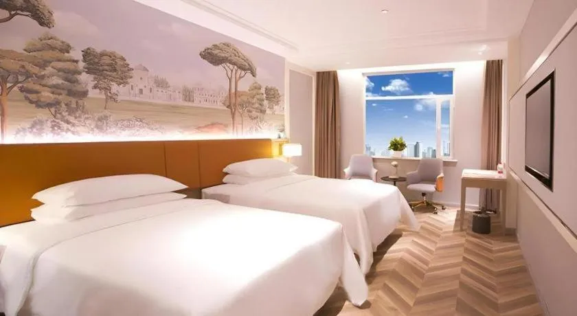 Bed in Vienna Hotel Jinan Beiyuan Street Red Star Macalline