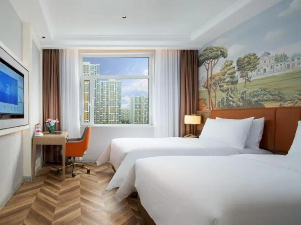 Bed in Vienna Hotel Jinan Beiyuan Street Red Star Macalline