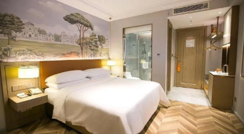 Bed in Vienna Hotel Jinan Beiyuan Street Red Star Macalline