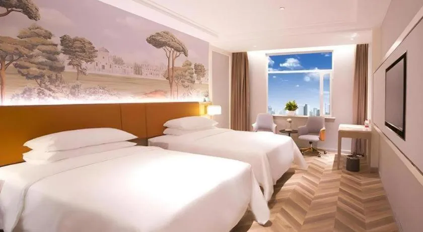 Bed in Vienna Hotel Jinan Beiyuan Street Red Star Macalline