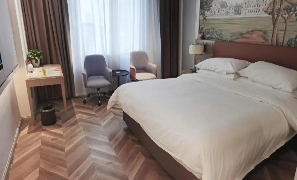 Bed in Vienna Hotel Jinan Beiyuan Street Red Star Macalline