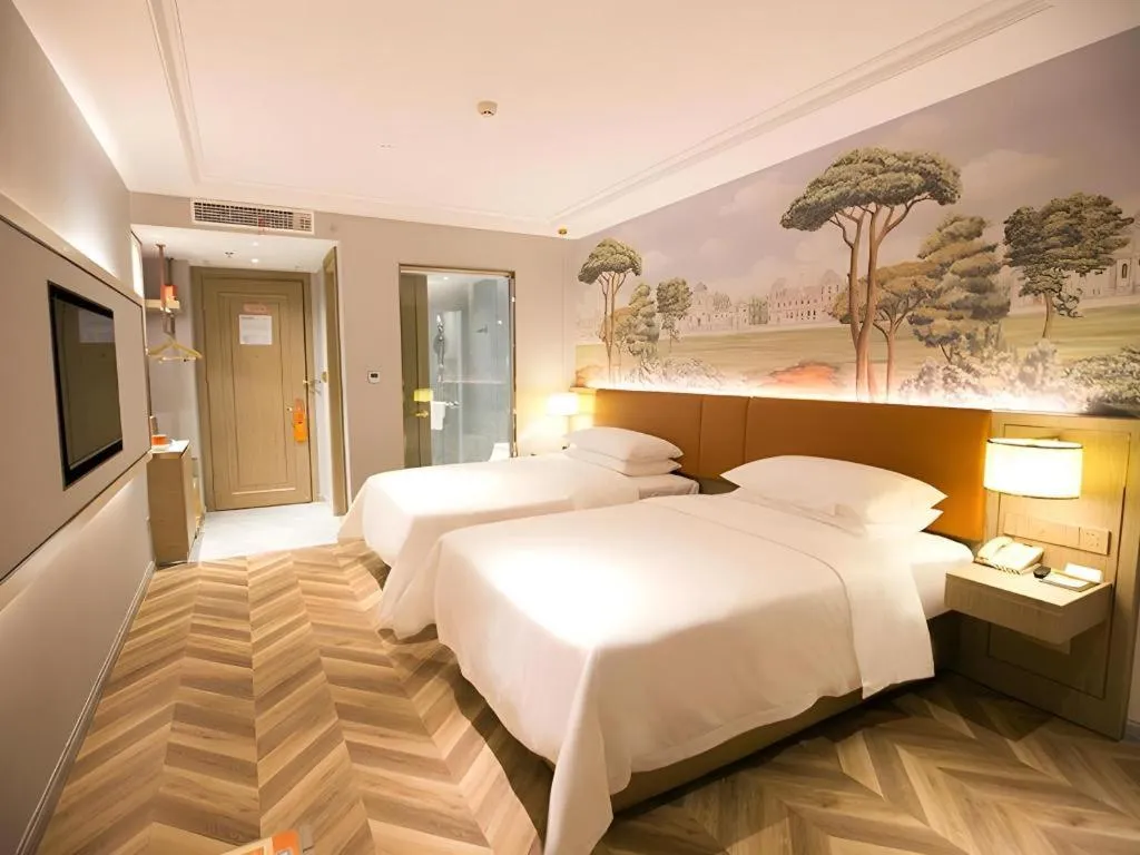 Bed in Vienna Hotel Jinan Beiyuan Street Red Star Macalline