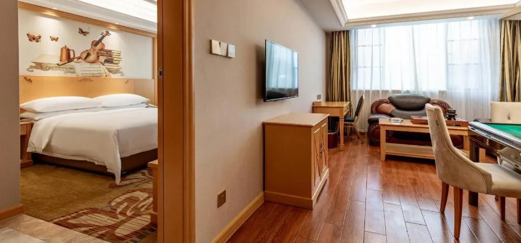 Bed in Vienna Hotel Guangdong Shaoguan Ruyuan Yao Cultural Square