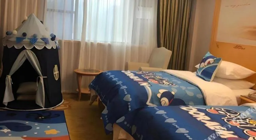 Bed in Vienna Hotel Guangdong Shaoguan Ruyuan Yao Cultural Square