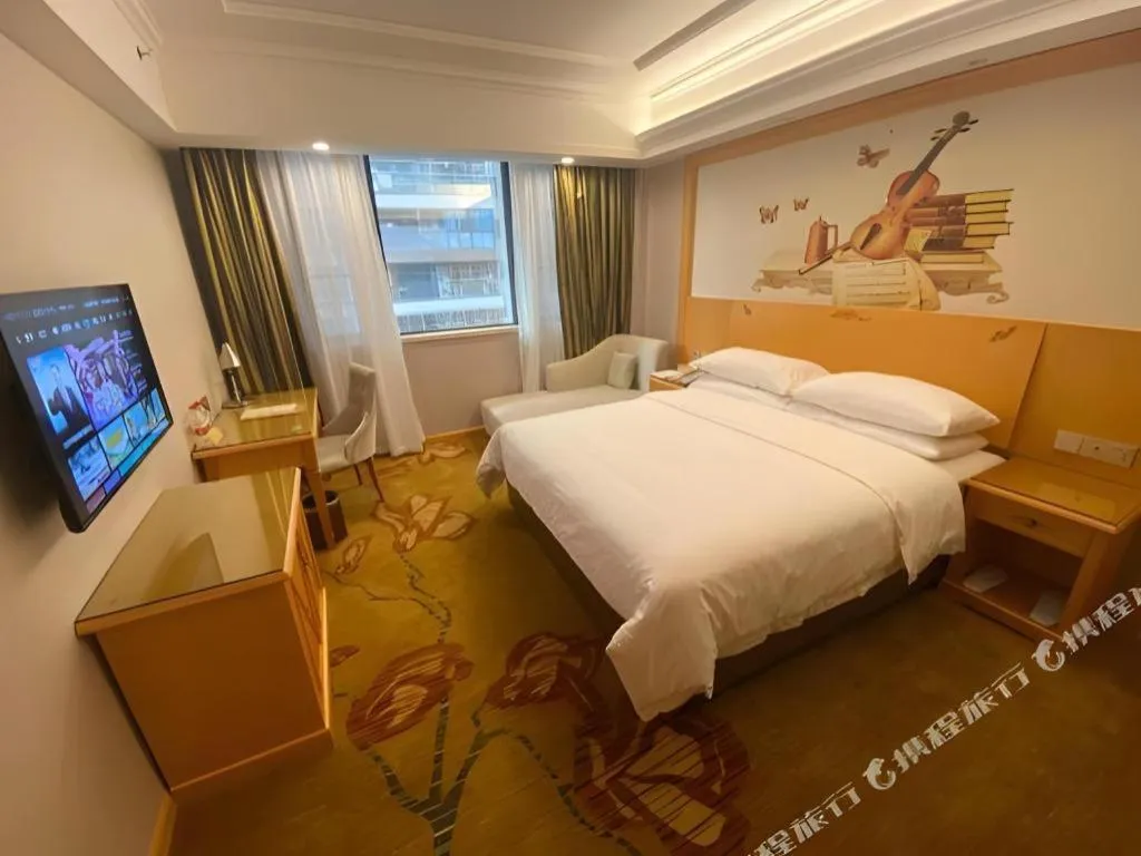 Bed in Vienna Hotel Guangdong Shaoguan Ruyuan Yao Cultural Square