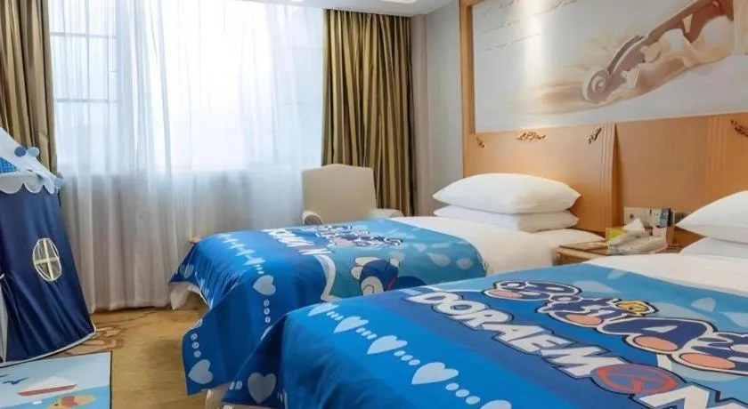 Bed in Vienna Hotel Guangdong Shaoguan Ruyuan Yao Cultural Square