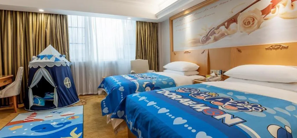 Bed in Vienna Hotel Guangdong Shaoguan Ruyuan Yao Cultural Square