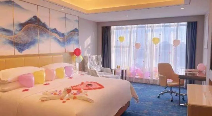 Bed in Venus Royal Hotel Guangxi Wuzhou Sanqicheng Meiguihu Park