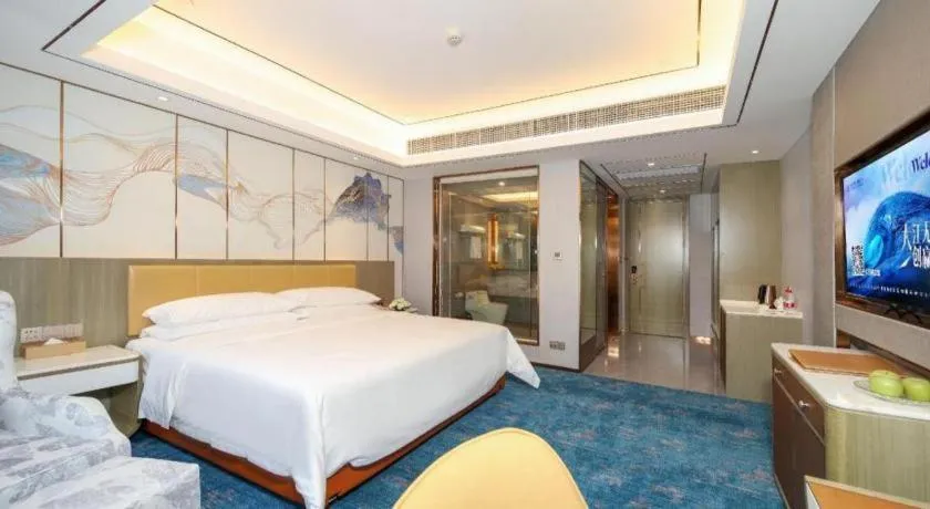 Bed in Venus Royal Hotel Guangxi Wuzhou Sanqicheng Meiguihu Park