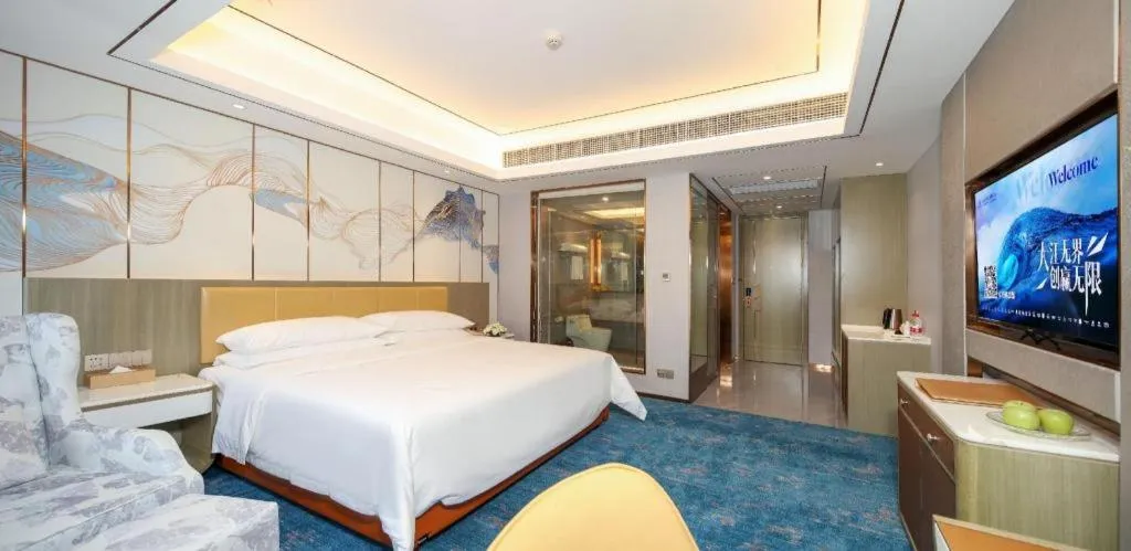 Bed in Venus Royal Hotel Guangxi Wuzhou Sanqicheng Meiguihu Park