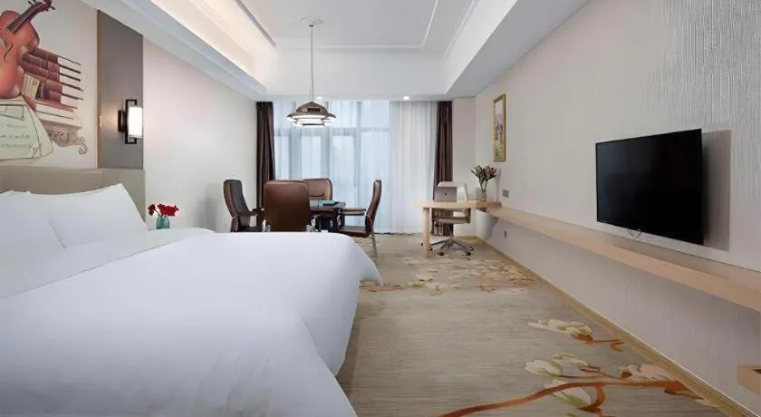 Bed in Vienna Hotel Anhui Taihe Baitai Xingma International