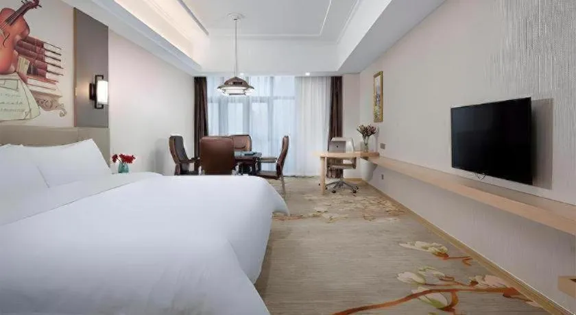 Bed in Vienna Hotel Anhui Taihe Baitai Xingma International