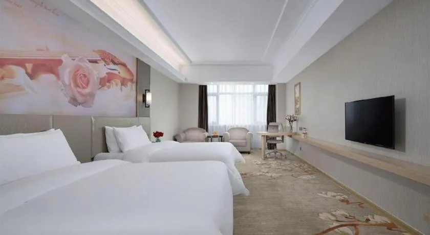 Bed in Vienna Hotel Anhui Taihe Baitai Xingma International