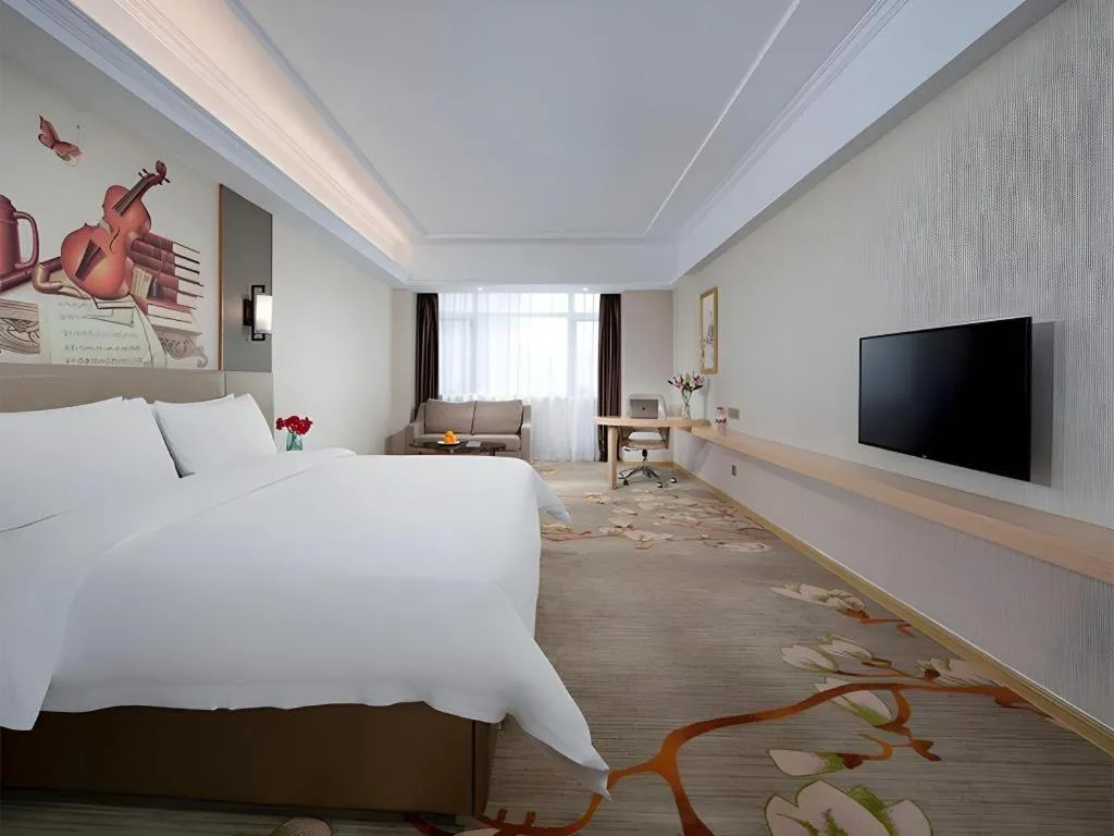 Bed in Vienna Hotel Anhui Taihe Baitai Xingma International