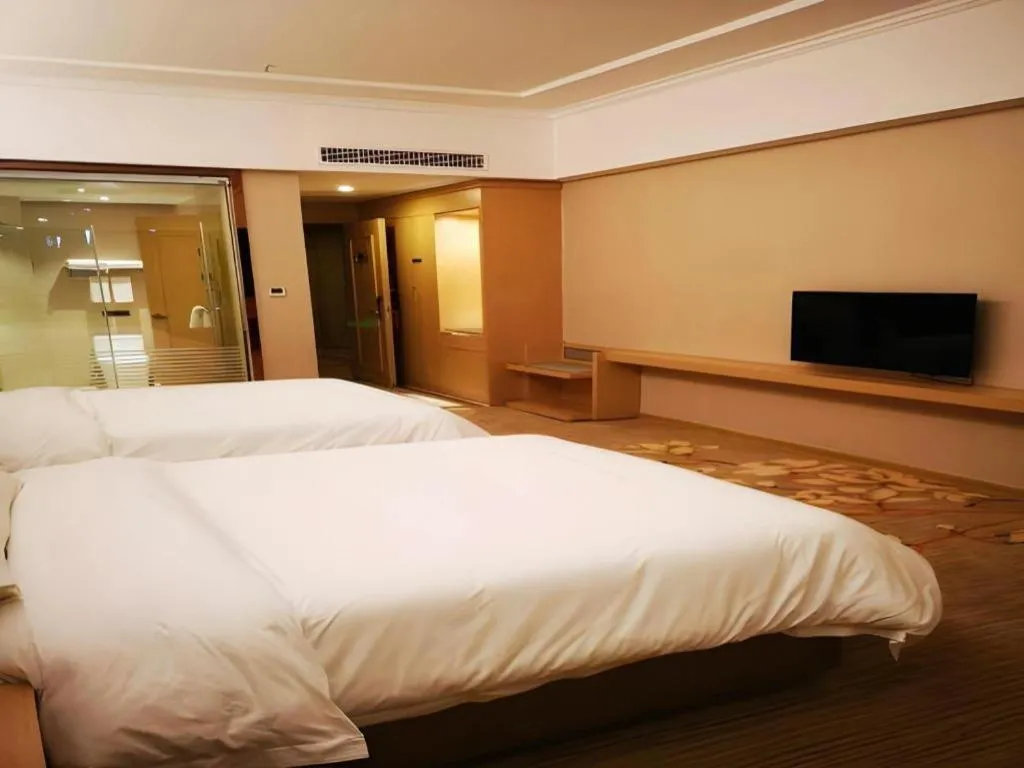 Bed in Vienna Hotel Anhui Taihe Baitai Xingma International