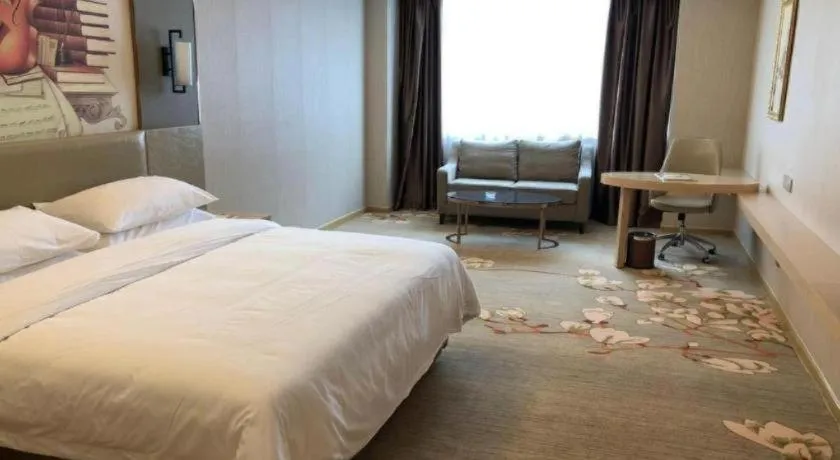 Bed in Vienna Hotel Anhui Taihe Baitai Xingma International