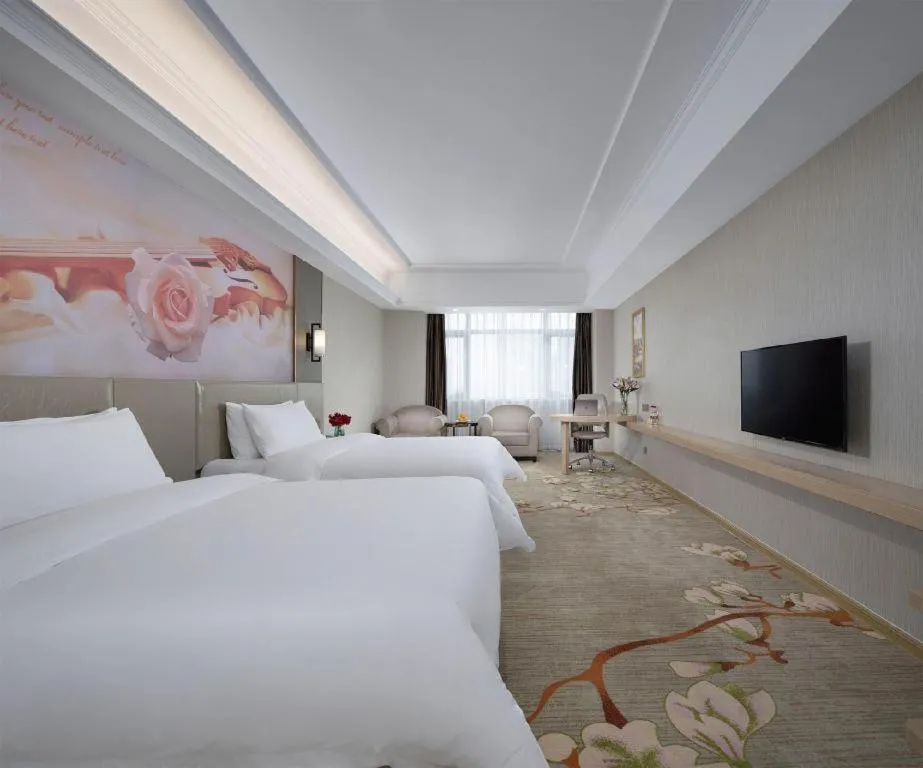 Bed in Vienna Hotel Anhui Taihe Baitai Xingma International