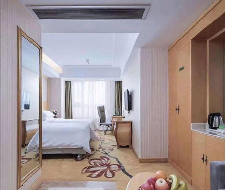 Bed in Vienna Hotel Anhui Taihe Baitai Xingma International