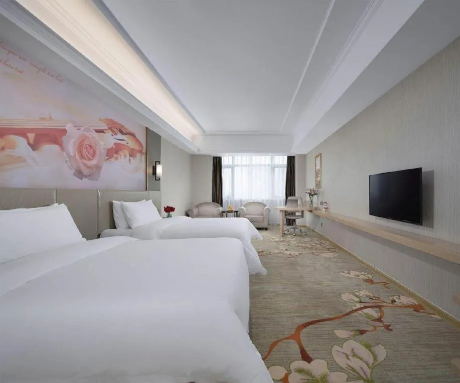 Bed in Vienna Hotel Anhui Taihe Baitai Xingma International