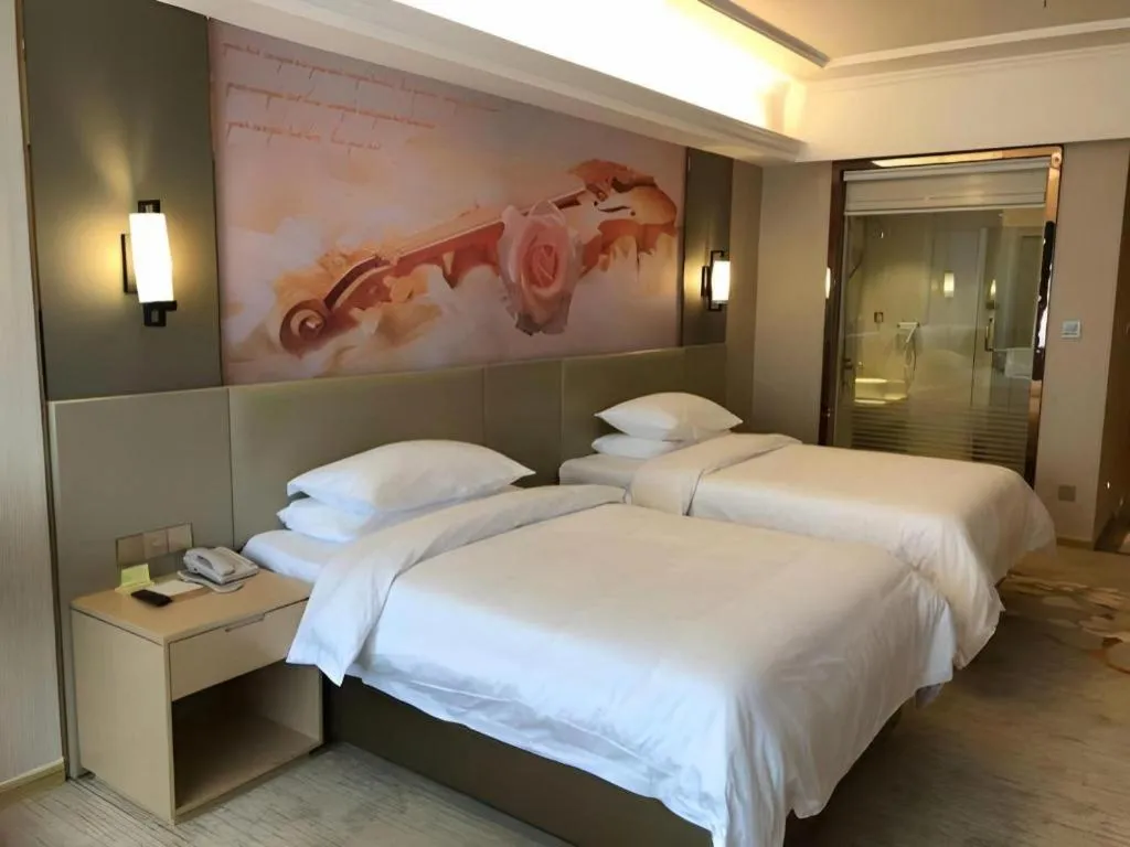 Bed in Vienna Hotel Anhui Taihe Baitai Xingma International