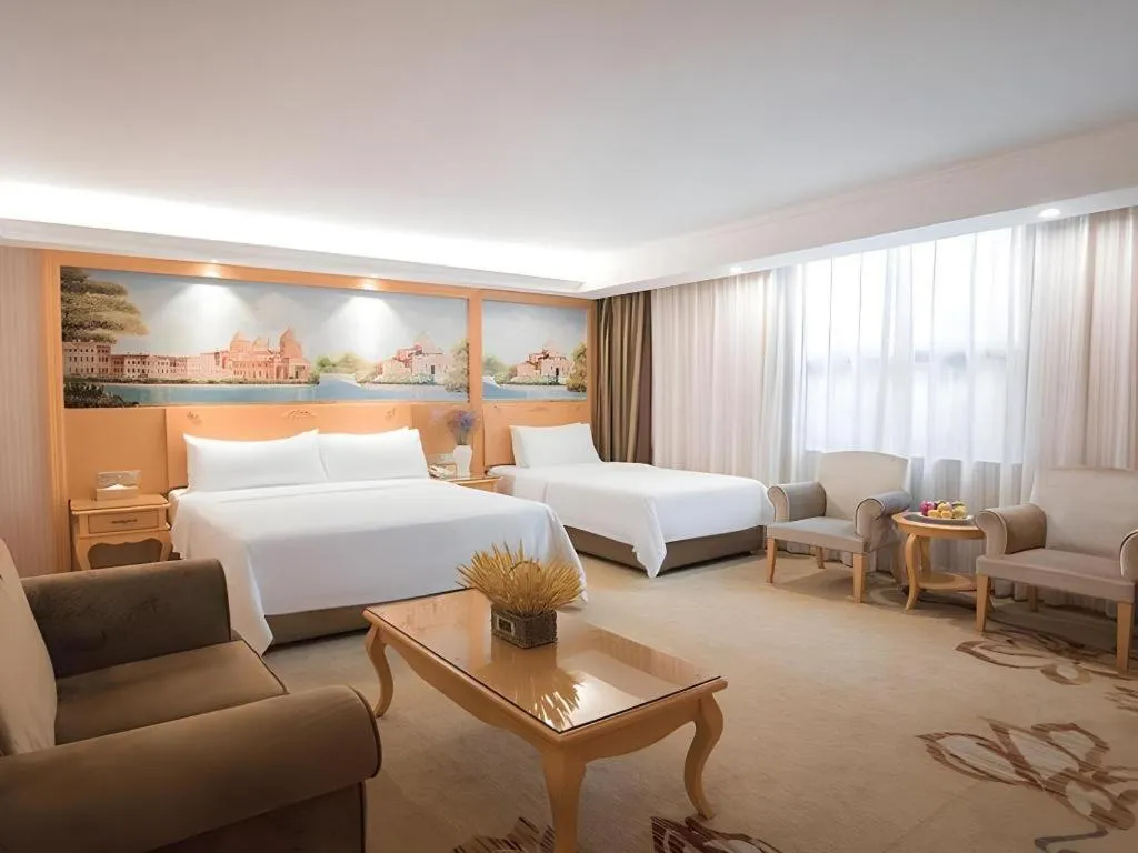 Bed in Vienna Hotel Guangdong Boluo Fu Mountain Scenic Spot