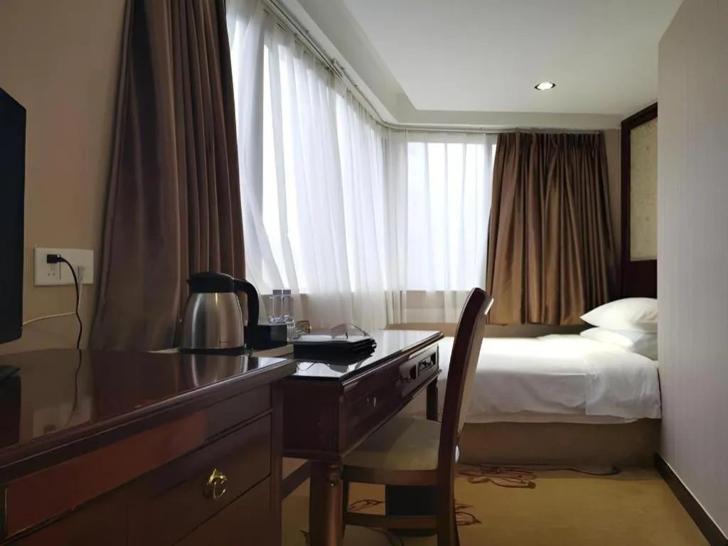 Bed in Vienna Hotel Guangdong Boluo Fu Mountain Scenic Spot