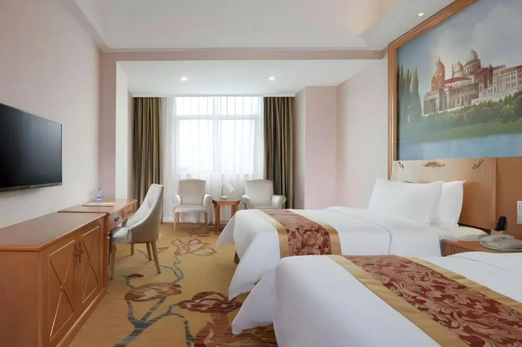 Bed in Vienna Hotel Guangdong Boluo Fu Mountain Scenic Spot