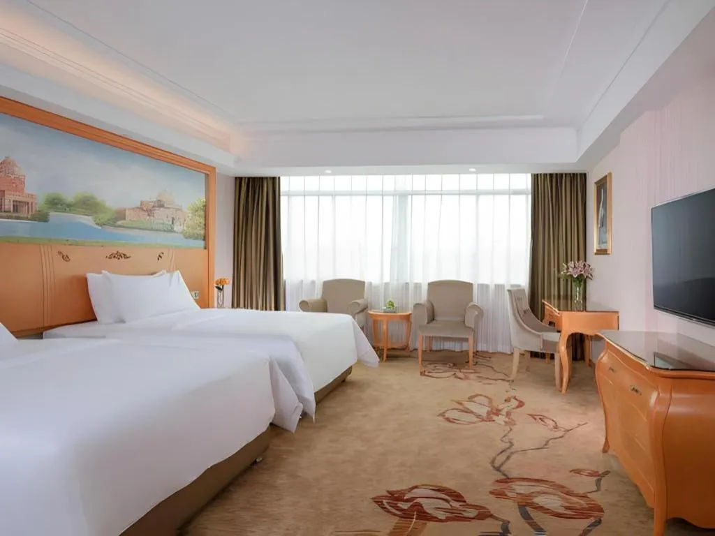 Bed in Vienna Hotel Guangdong Boluo Fu Mountain Scenic Spot