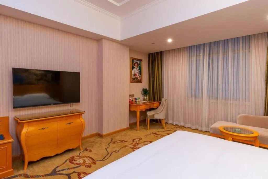 Bed in Vienna Hotel Guangdong Boluo Fu Mountain Scenic Spot
