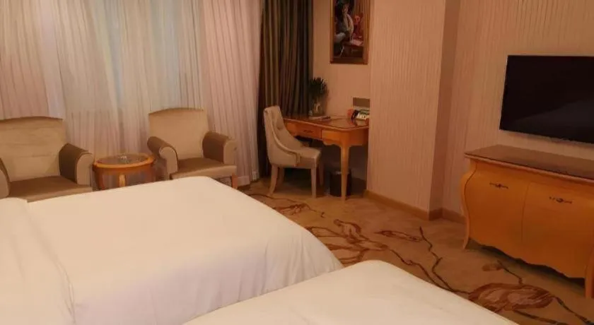 Bed in Vienna Hotel Guangdong Boluo Fu Mountain Scenic Spot