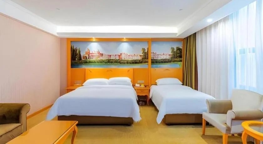 Bed in Vienna Hotel Guangdong Boluo Fu Mountain Scenic Spot