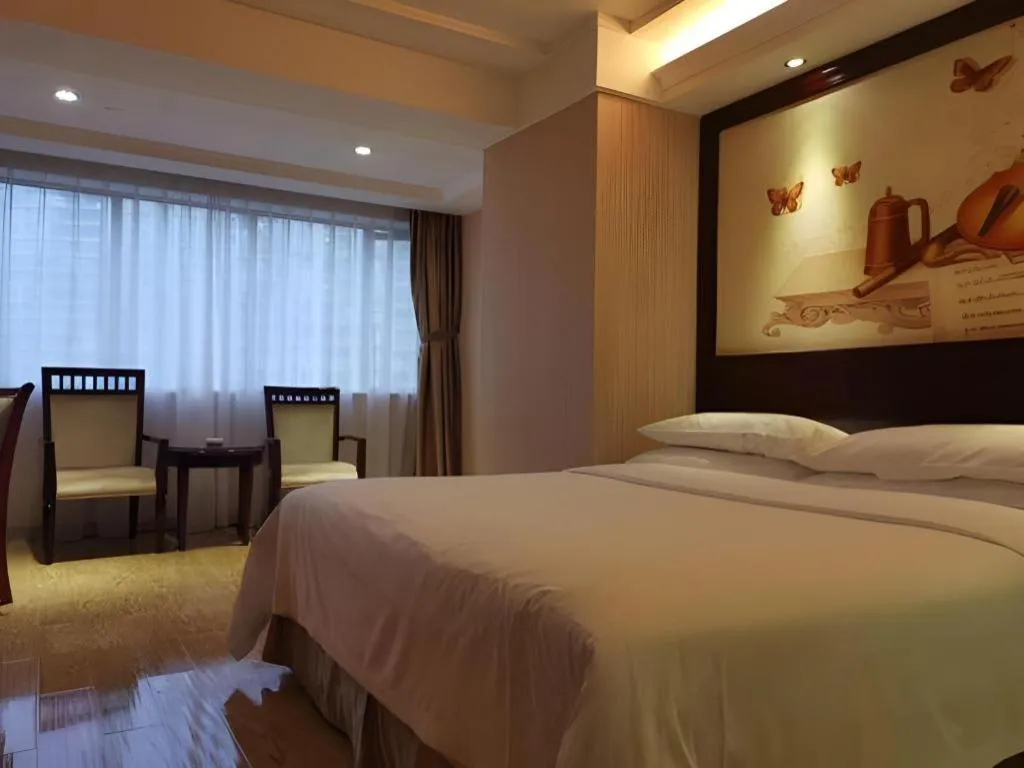 Bed in Vienna Hotel Guangdong Boluo Fu Mountain Scenic Spot