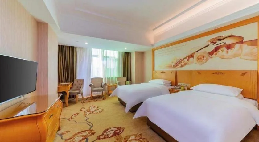 Bed in Vienna Hotel Guangdong Boluo Fu Mountain Scenic Spot